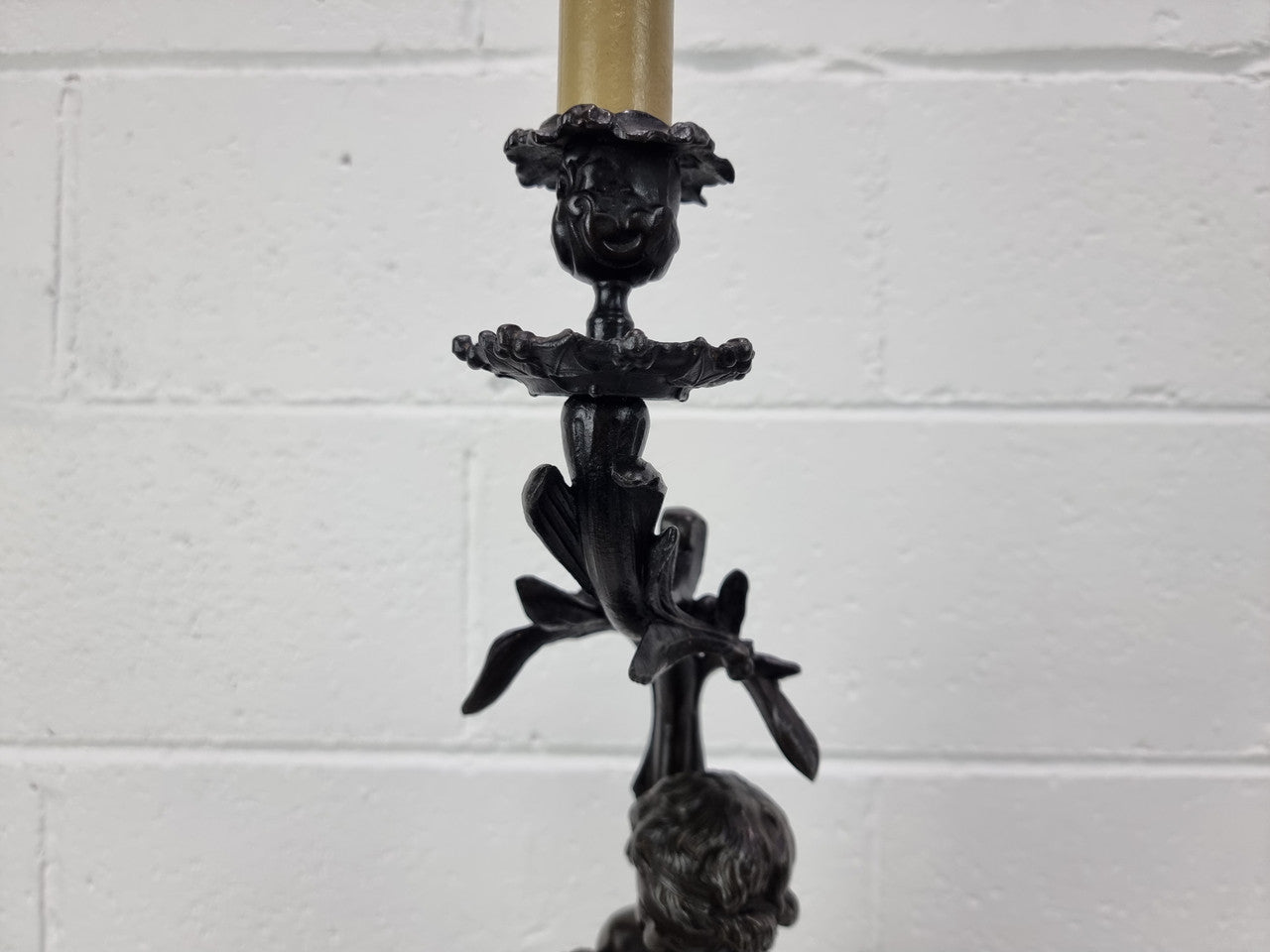 Antique French bronzed metal lamp with cherub's. in very good working original detailed condition.