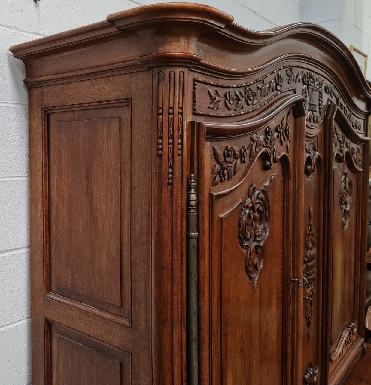 Beautiful 19th century Walnut Louis XV style sideboard with plenty of storage space. The top has two doors that open up to three adjustable shelves. It is in good original detailed condition.