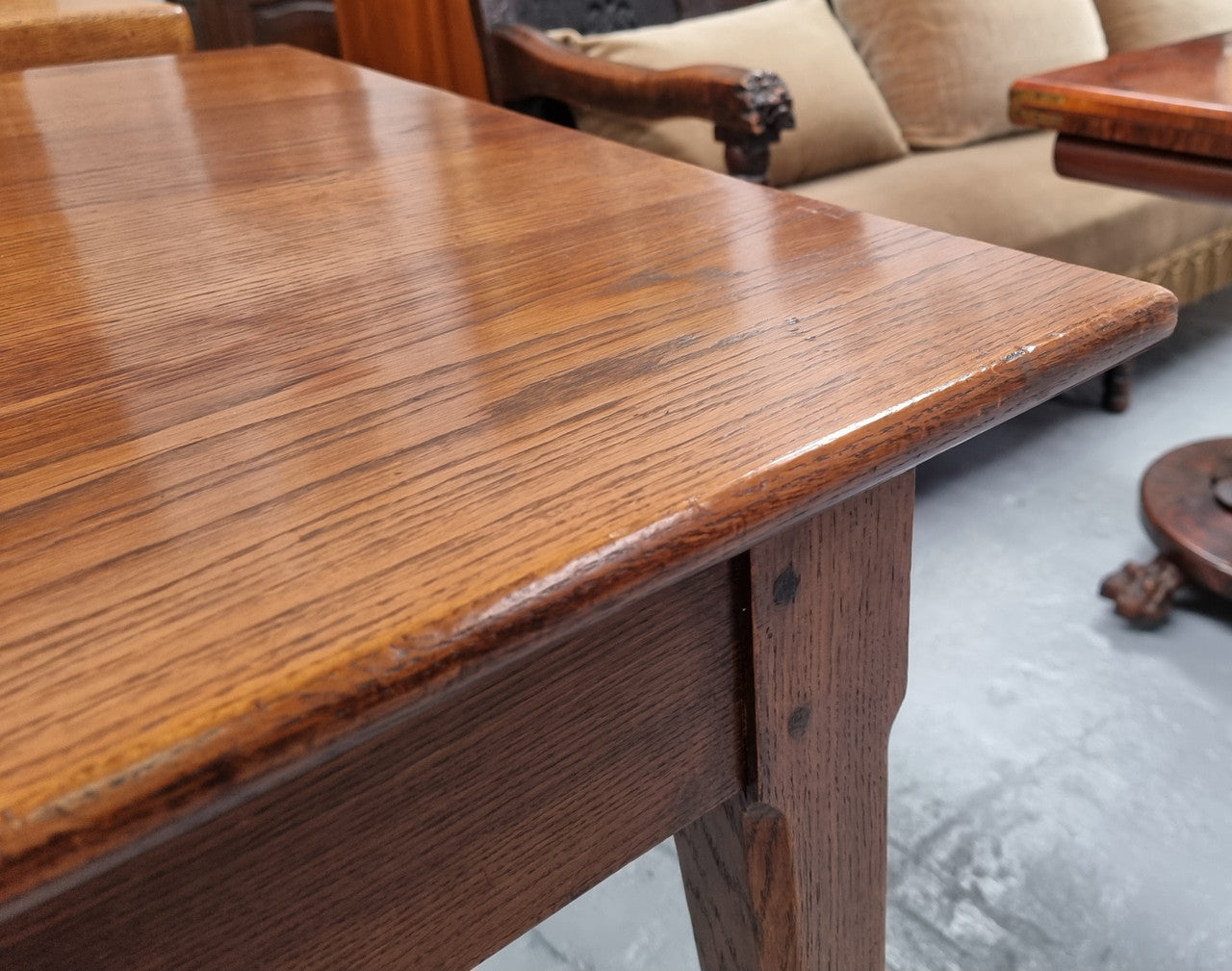 Antique French Oak Farmhouse table in fully restored condition. Features a single drawer and tapered legs.
