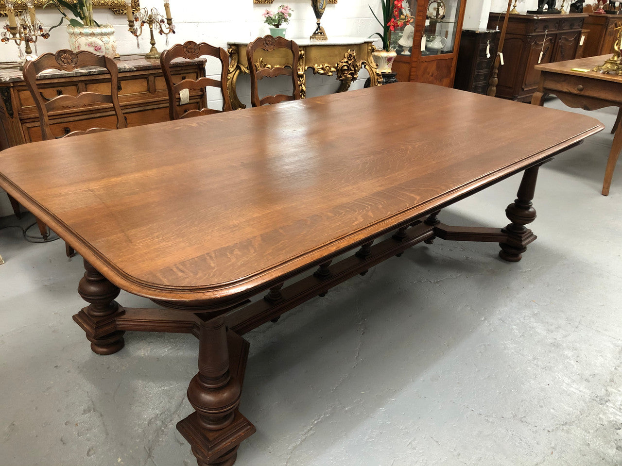 Large French Oak 19th century Henry II style dining table. It can seat 8 very comfortable and being very wide at 119 cm there is plenty of space to sit 10. In good original detailed condition.