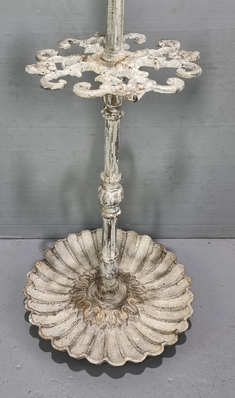Lovely Antique French cast iron hat /coat/umbrella stand with ten arms, and in good original detailed condition.