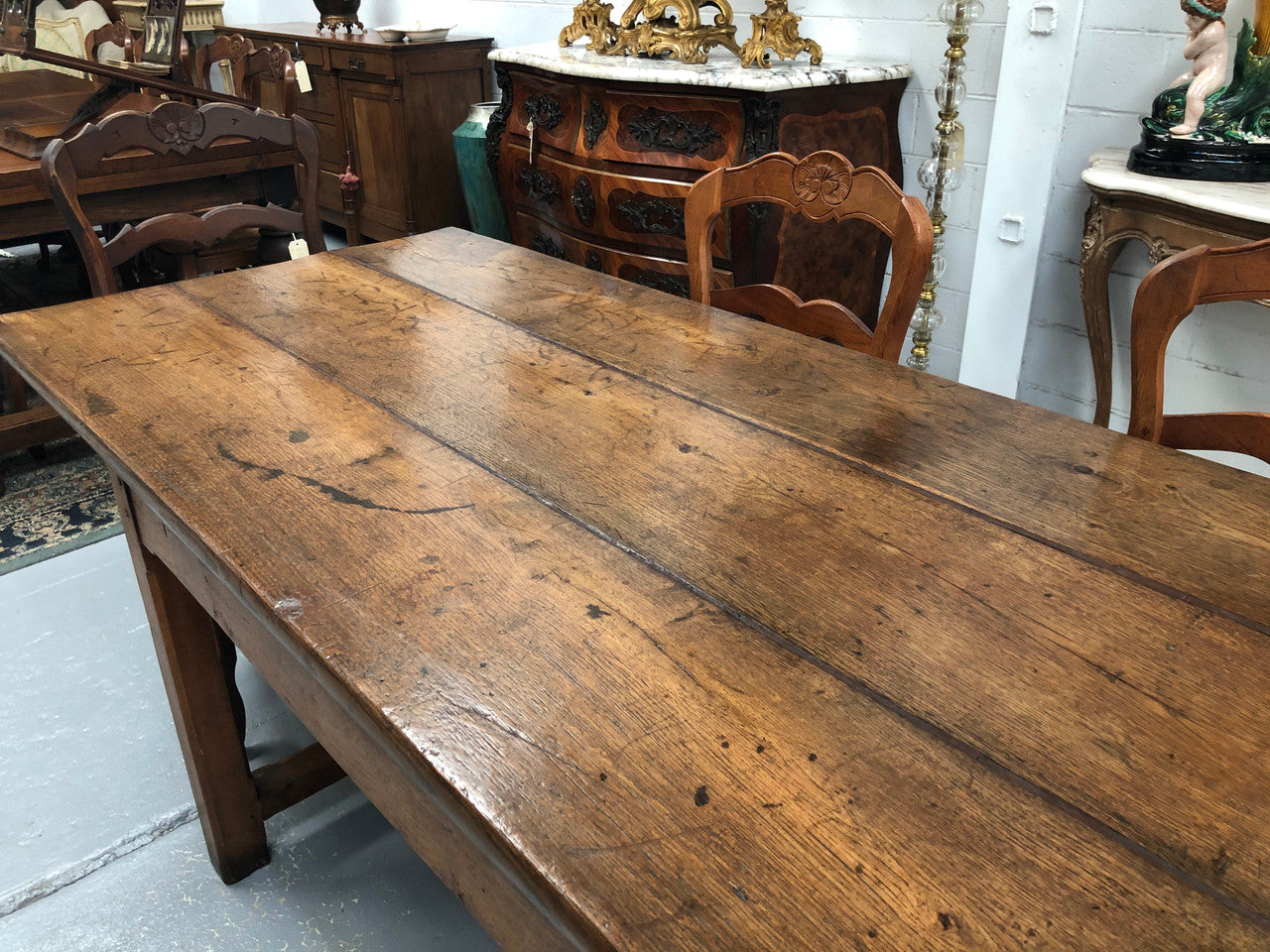19th Century French three meter Farmhouse table with a beautiful original rustic top. In very good original detailed condition.