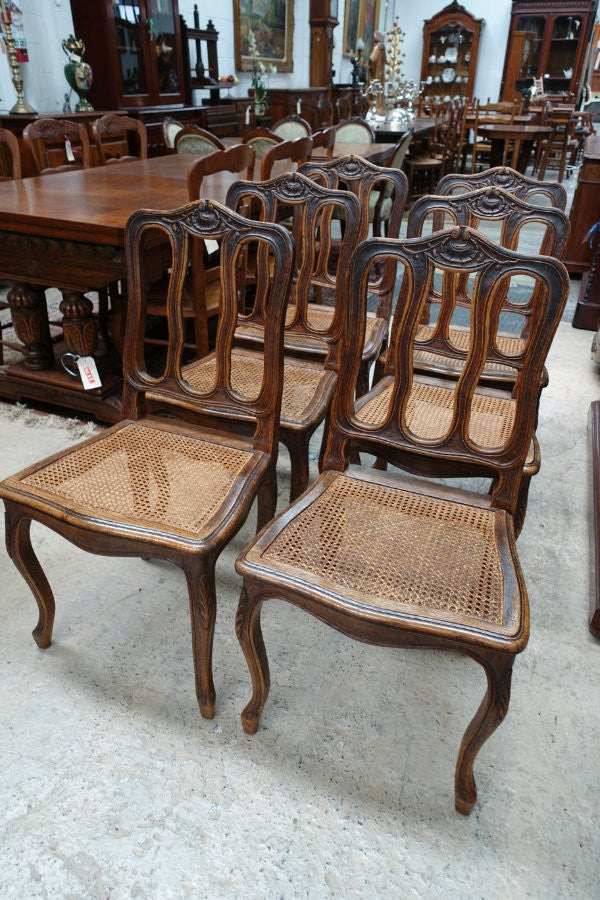 Fabulous set of 6 French oak dining chairs with cane seating in fantastic original condition.