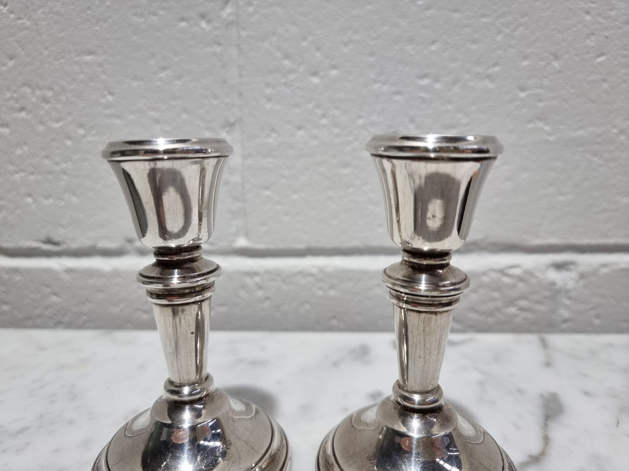 Pair of Birmingham sterling silver candlesticks date marks 1967. In good original condition, please view photos as they help form part of the description.