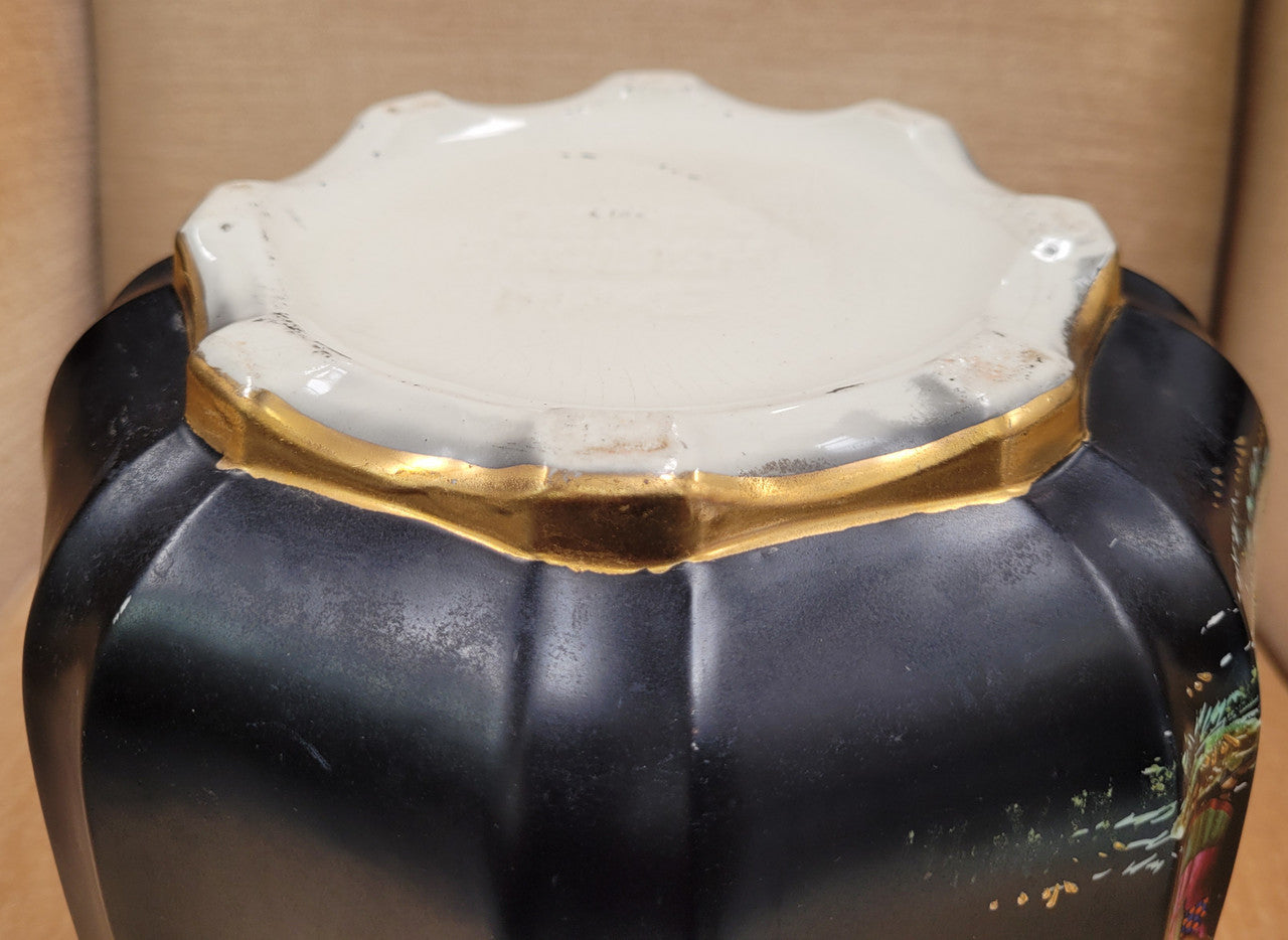 Stunning antique Jardinière with a black background and colorful oriental scene with gold trim. It is in good original condition It is in good original condition please view photos has they help form part of the description. Stamped "Olympic English Make"