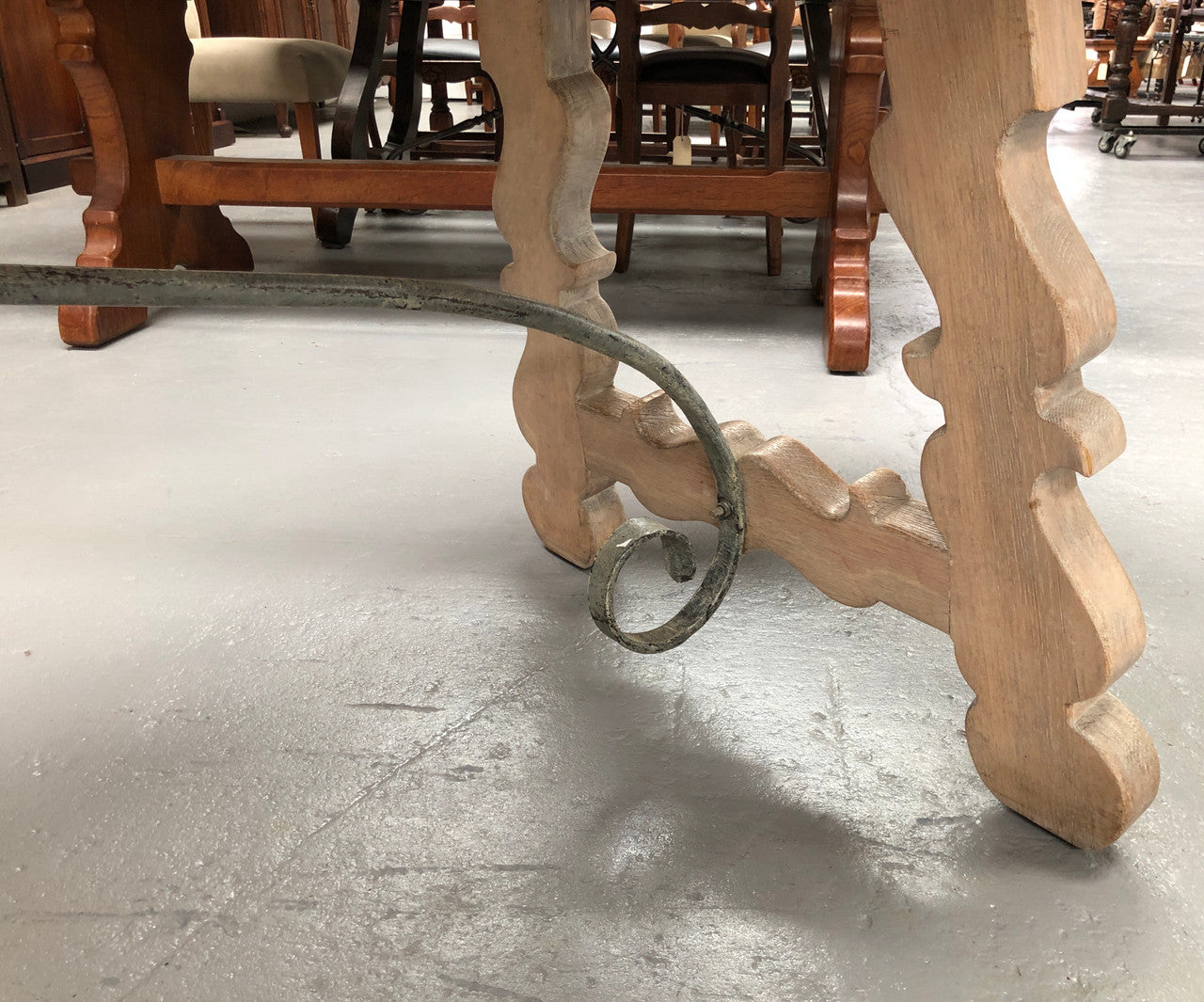 Limed French Oak Farmhouse table with decorative iron base. In good original detailed condition.