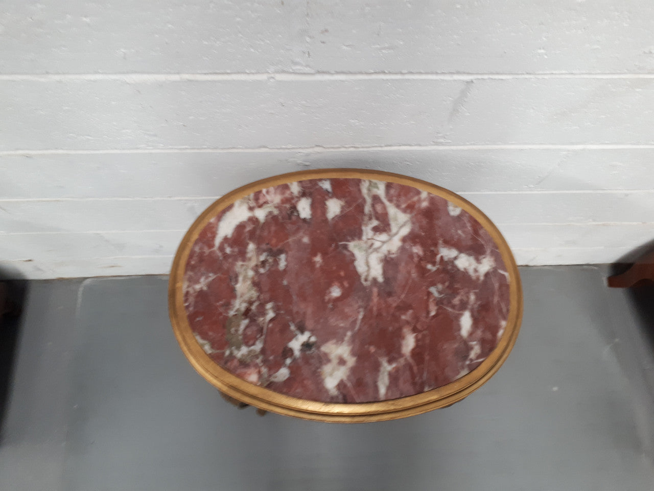 An exceptional & rare 18th century Louis XVI oval inset marble top & giltwood side table with original water gilding. In good restored condition. Circa 1790.