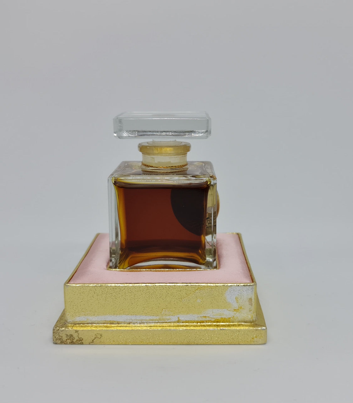 Beautiful Vintage snare "Mary Kay" French bottle of perfume. It is in amazing condition. Comes with pink and gold tray.