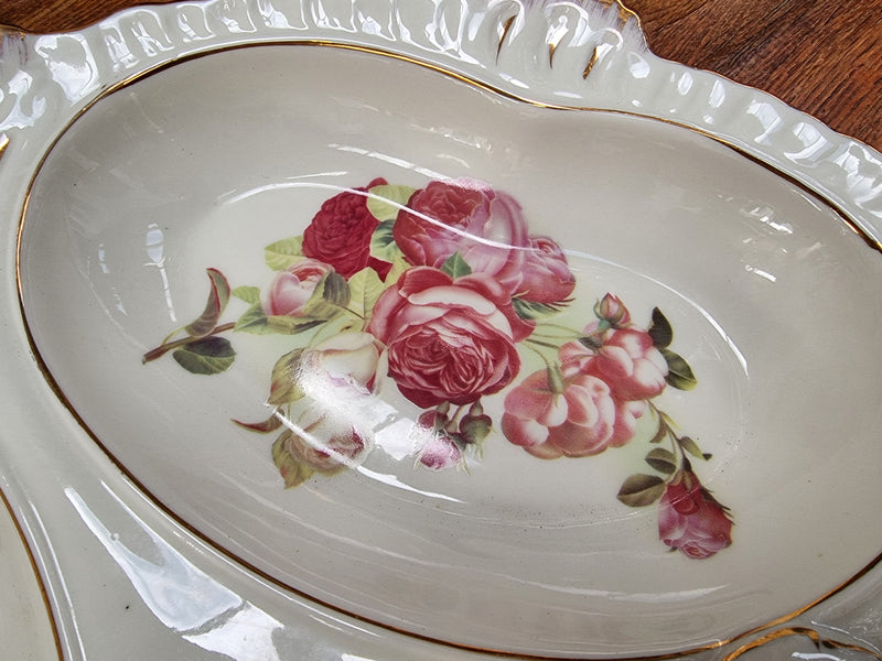 Vintage ceramic three sectional floral bowl with handle and gilt rim. Stamped underneath and in good original condition with no chips or cracks. Please view photos as they help form part of the description.