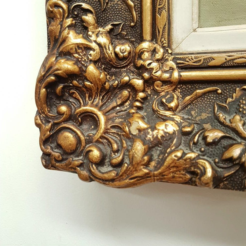 An Antique framed floral painting of lilacs in a vase on canvas, signed and in fantastic original condition.