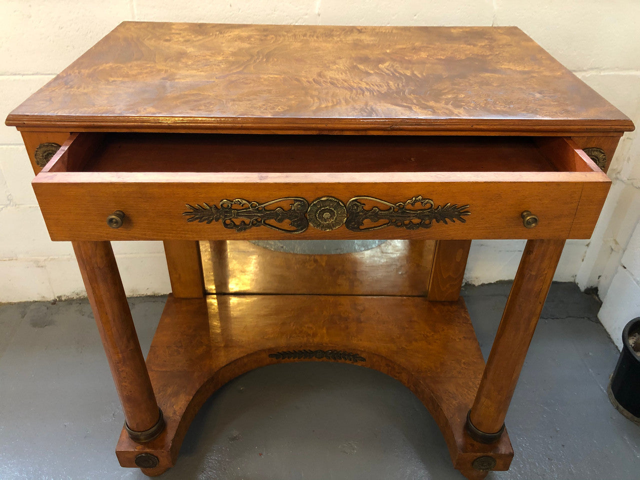 Art Deco Empire Style Console/Desk. It has a mirror underneath and a dawer. It could be used as a console table or as a small desk. In good restored condition.