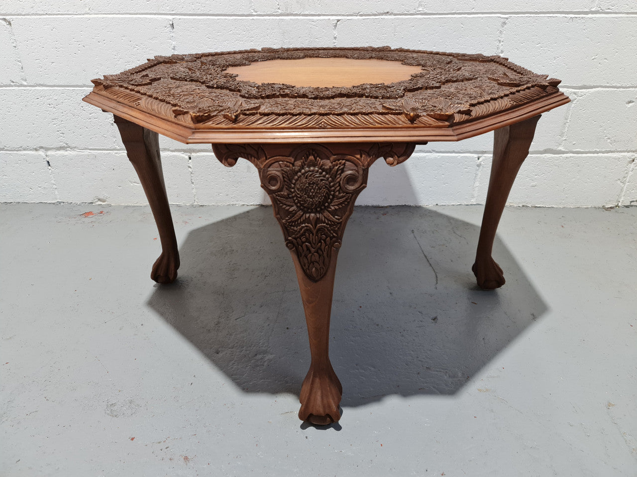 Heavily carved Teakwood round Chinese coffee table. In good original detailed condition. Circa: 1920