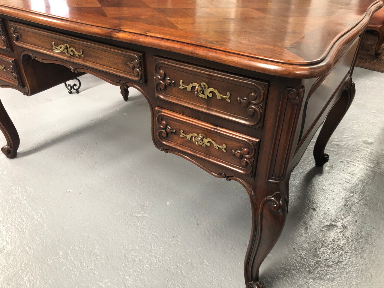 Antique French Walnut and parquetry top Louis XV style partners desk. In good original detailed condition.