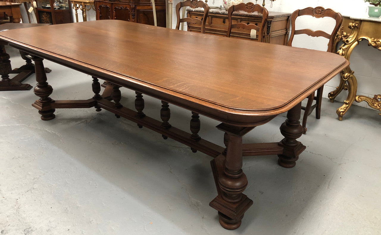 Large French Oak 19th century Henry II style dining table. It can seat 8 very comfortable and being very wide at 119 cm there is plenty of space to sit 10. In good original detailed condition.