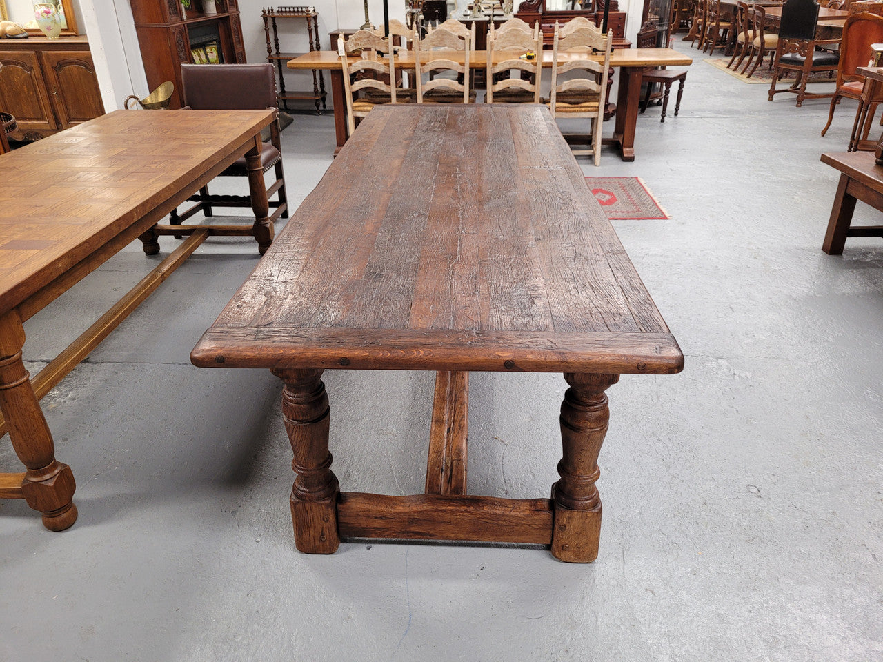 Amazing 2.65 meter French Elm Refectory dining table with loads of rustic charm. This table has been sourced from France and can comfortably seat ten people. It is in good original detailed condition.