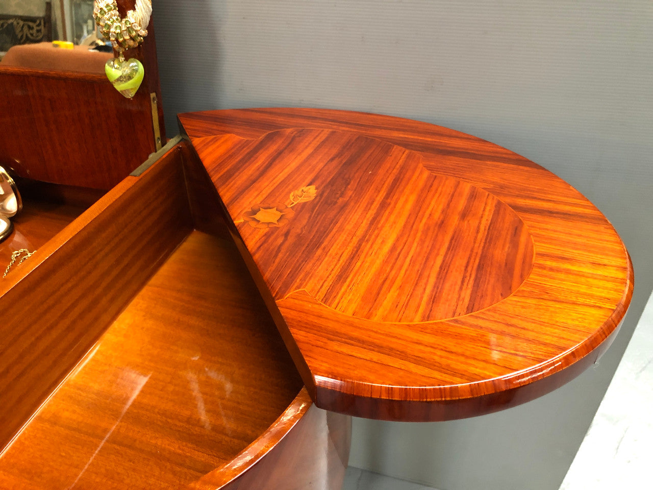 French Mahogany hidden dressing table with beautiful marquetry inlay. In good restored condition. Circa: 1950's