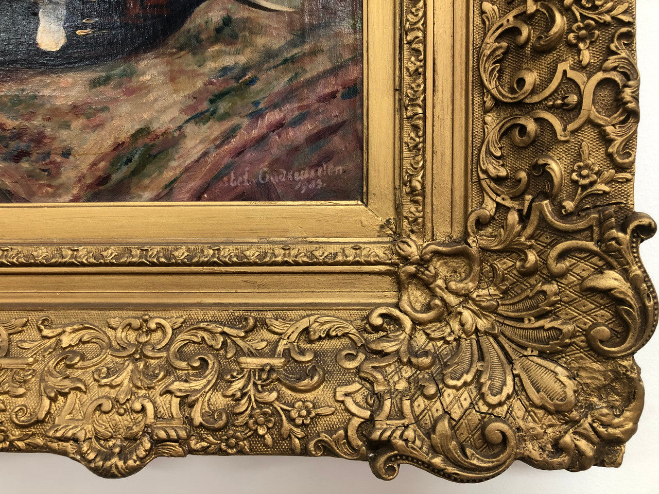 An Antique gilt-framed oil painting of floral still life. Housed in a double sweep gilt frame, signed and dated in good condition.
