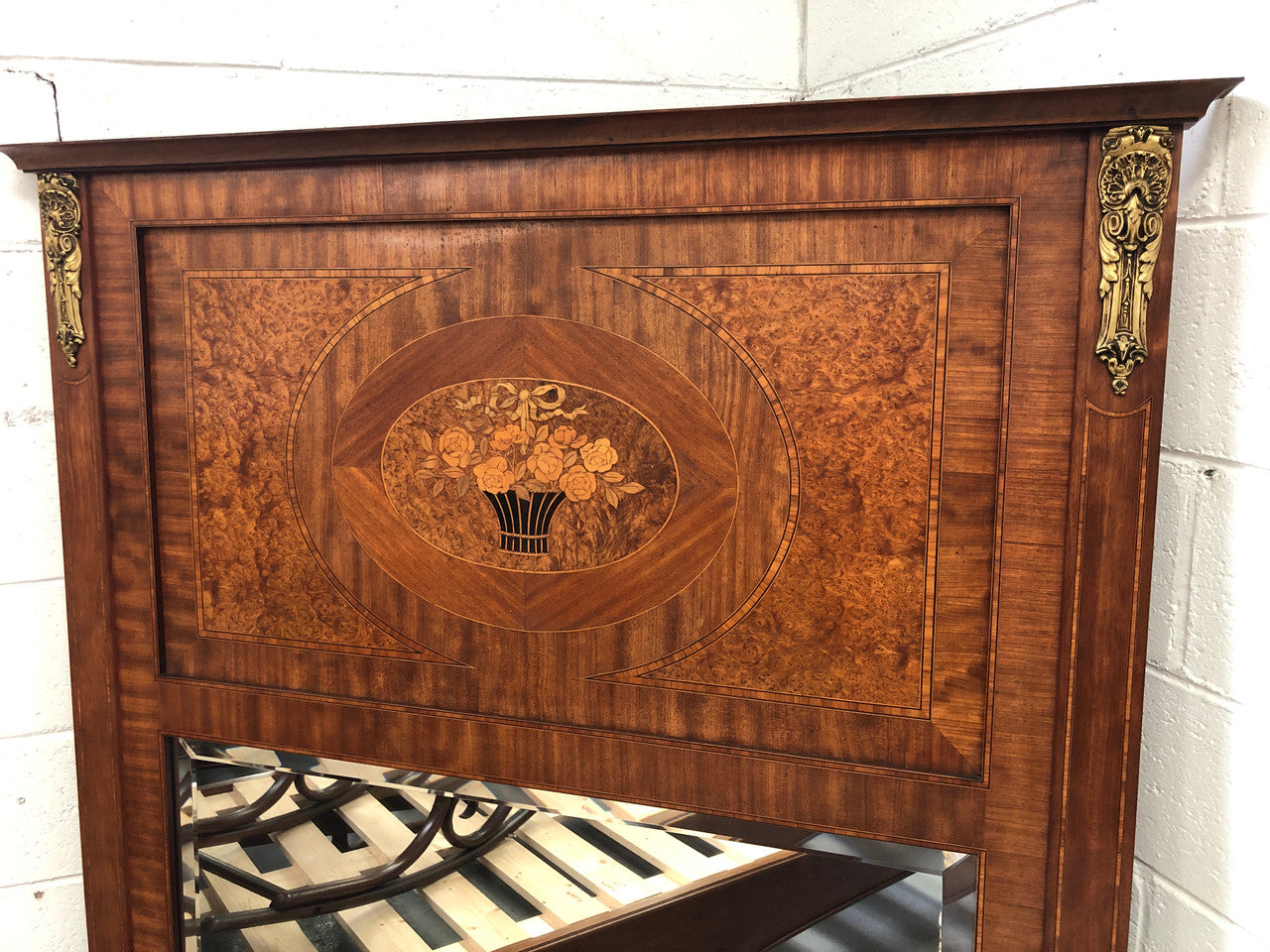 Beautiful Amboyna and Walnut Trumeau mirror. Has lovely parquetry inlay and is in good original condition.