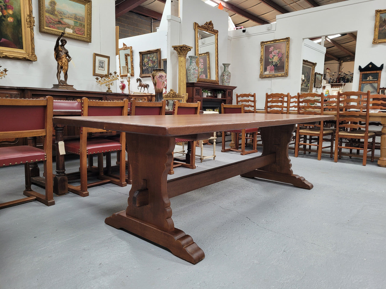 Sensational long French Oak farmhouse table of large proportions on a stretcher base. It has been fully restored with a hard oil water resistant finish. This fabulous table would seat 10 to 12 people.