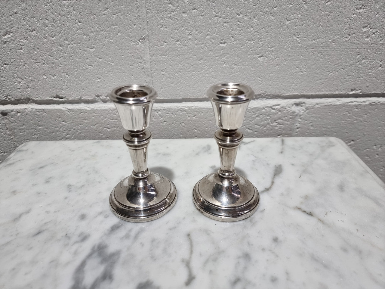Pair of Birmingham sterling silver candlesticks date marks 1967. In good original condition, please view photos as they help form part of the description.
