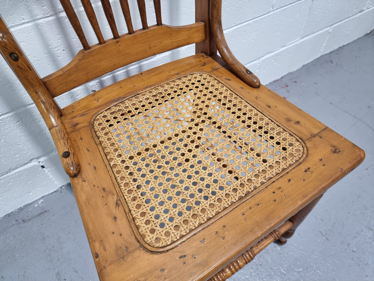 Australian Emu chair with cane inset seat. In good original condition.