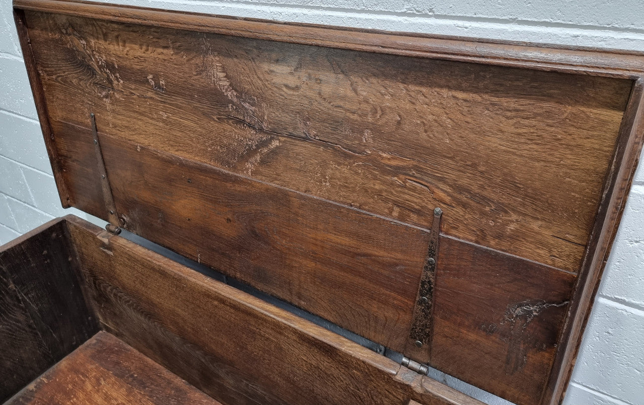 Fabulous carved French oak Antique Coffer / Chest with a lift up lid and loads of beautiful character in good original detailed condition.