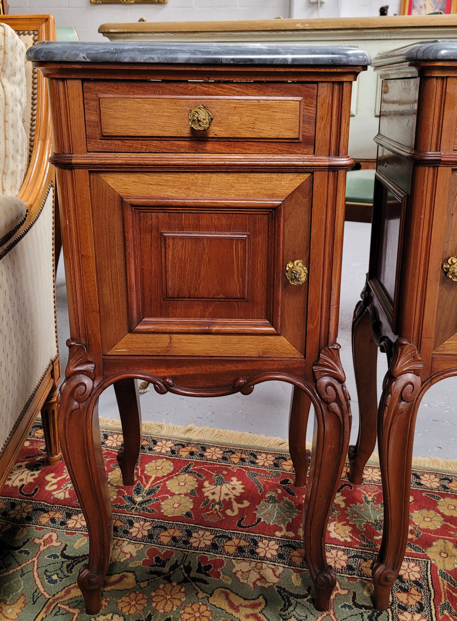 Pair of Walnut Louis XV style grey marble top bedside cabinets. Single drawer, one cupboard and lovely French cabriole legs. They have been sourced from France and are in good original condition.