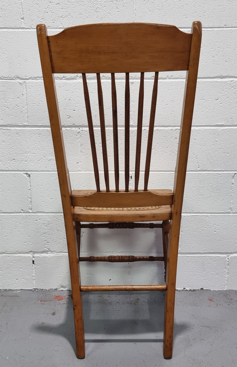 Australian Emu chair with cane inset seat. In good original condition.