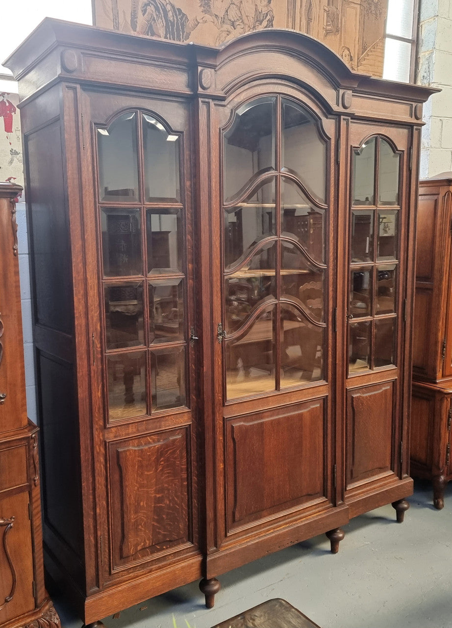 Late 19th Century French Oak three door bookcase. It has fully adjustable shelfs and is in good original detailed condition.