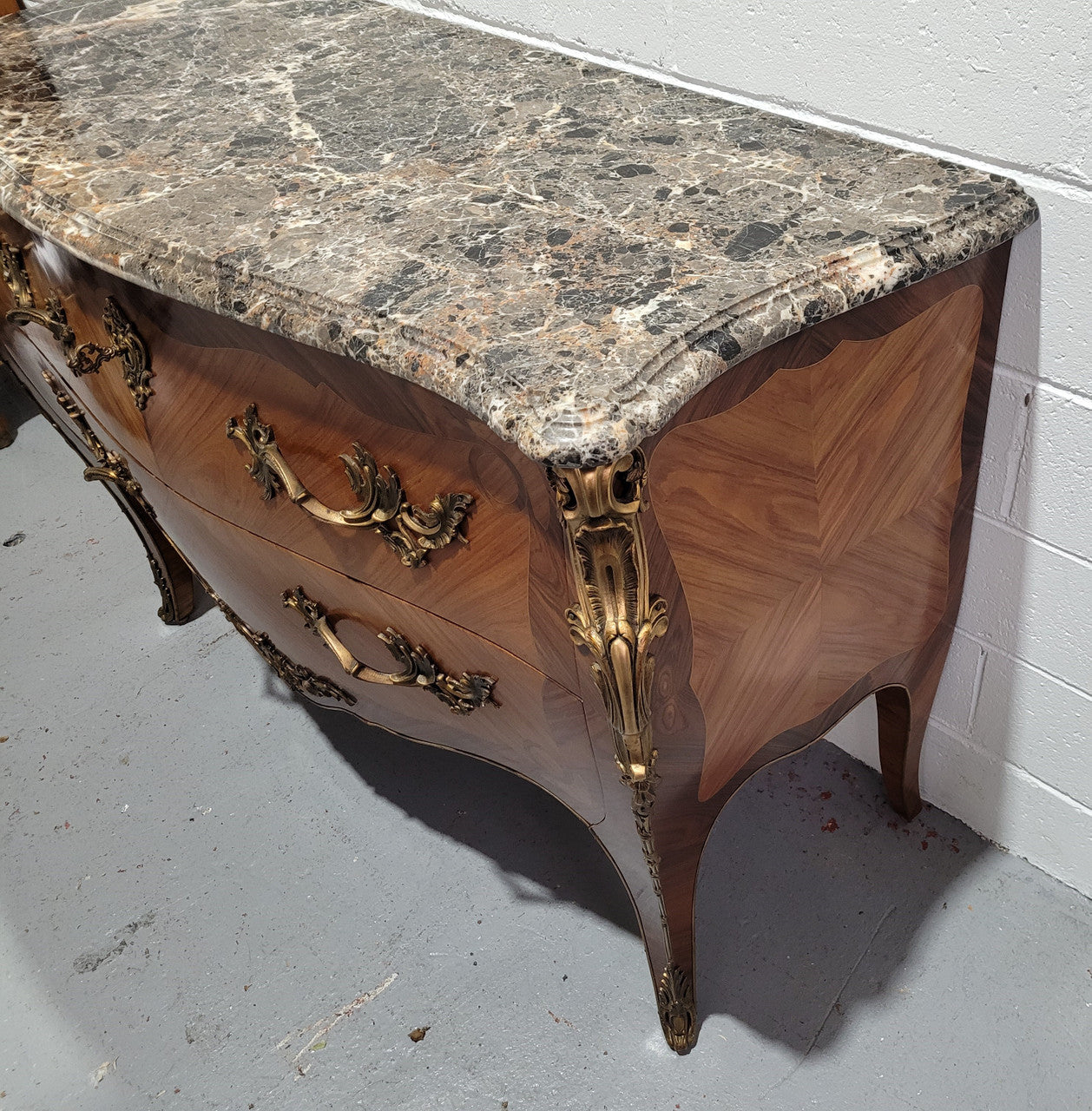 Stunning French Walnut and Rosewood Louis XV style two drawer commode with a beautiful marble top and ormolu mounts. In good original detailed condition.