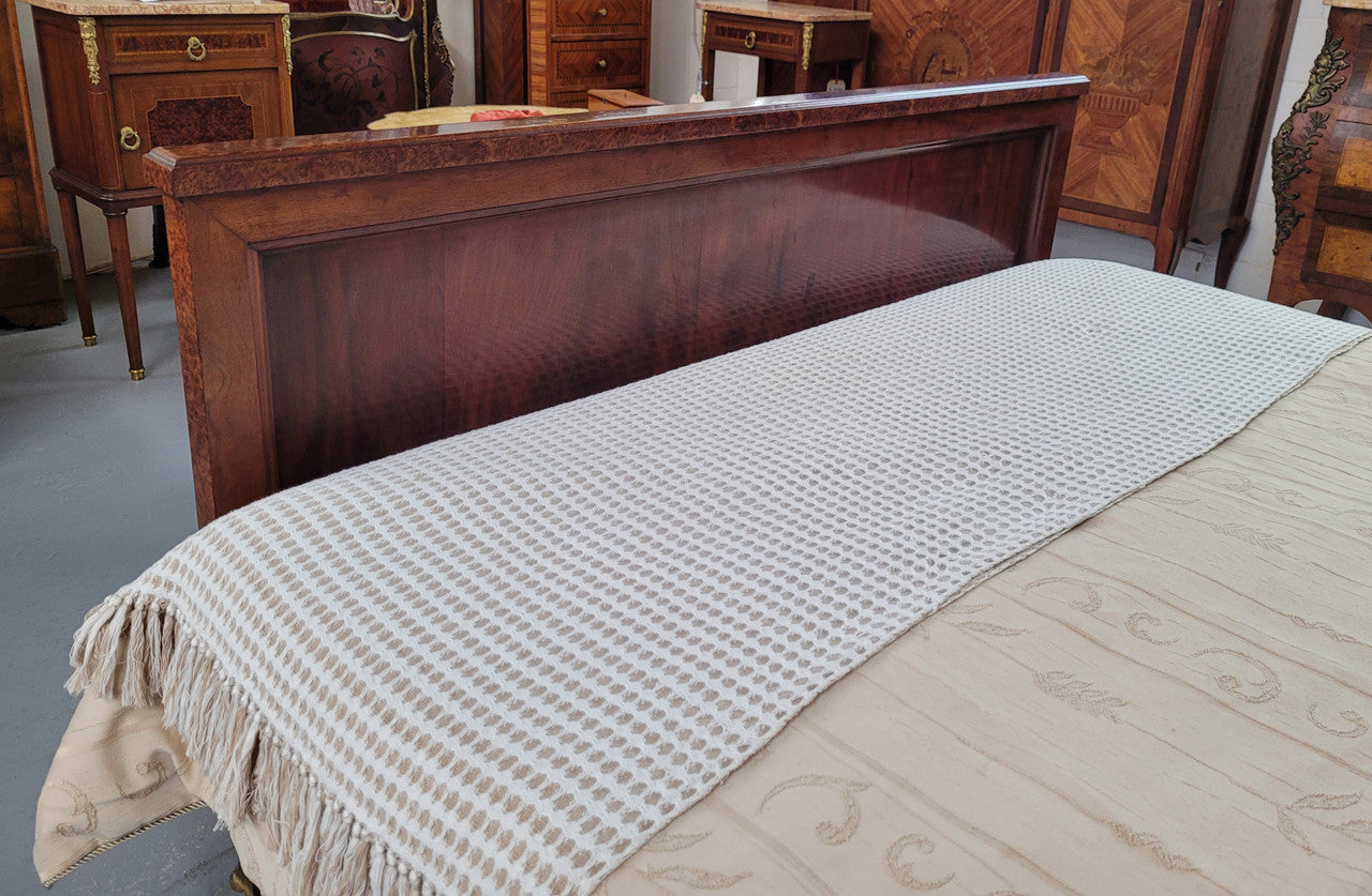 French Art Deco bedroom suite consisting of queen size bed in Amboyna wood and featuring pretty inlay. It comes with a matching pair of bedsides. It is a very stylish and high quality suite. It has been sourced from France and is in good original detailed condition.