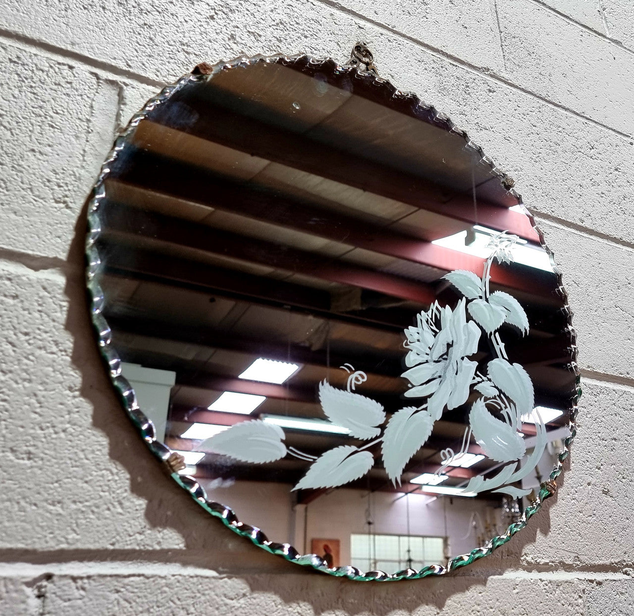 Vintage Art Deco round wall mirror with pie crust edge and etched floral design . In good condition, please see photos .