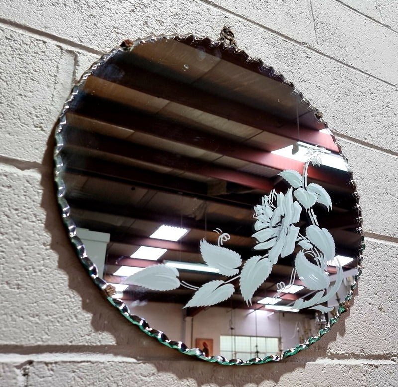 Vintage Art Deco round wall mirror with pie crust edge and etched floral design . In good condition, please see photos .