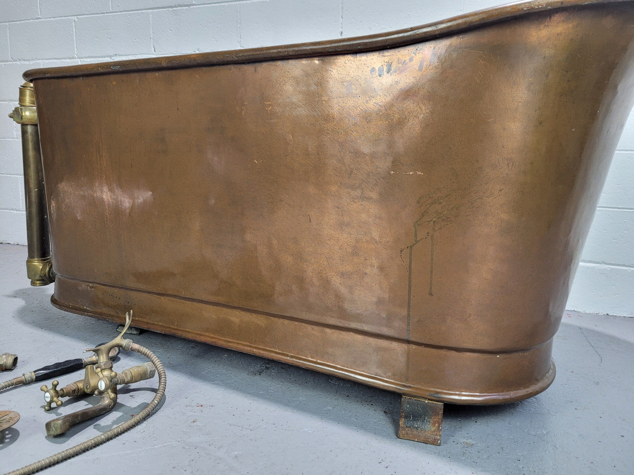 Sourced from France a rare full copper Antique bath tub on feet and includes an overflow, fittings, taps ect. In good original condition.
