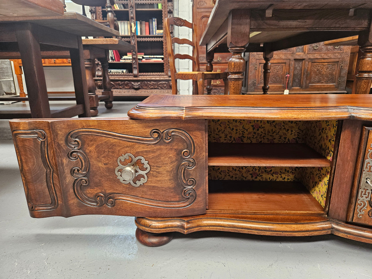 Appealing French Louis XVth style walnut converted TV unit. Central carved door & 2 Sliding Cupboards. In good condition.
