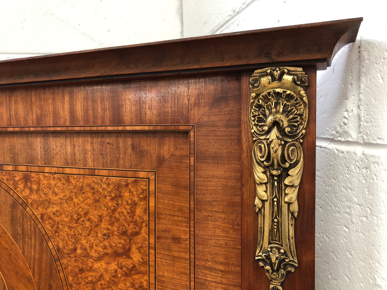 Beautiful Amboyna and Walnut Trumeau mirror. Has lovely parquetry inlay and is in good original condition.