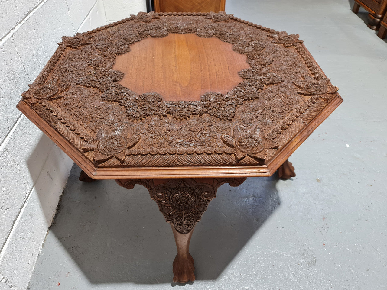 Heavily carved Teakwood round Chinese coffee table. In good original detailed condition. Circa: 1920