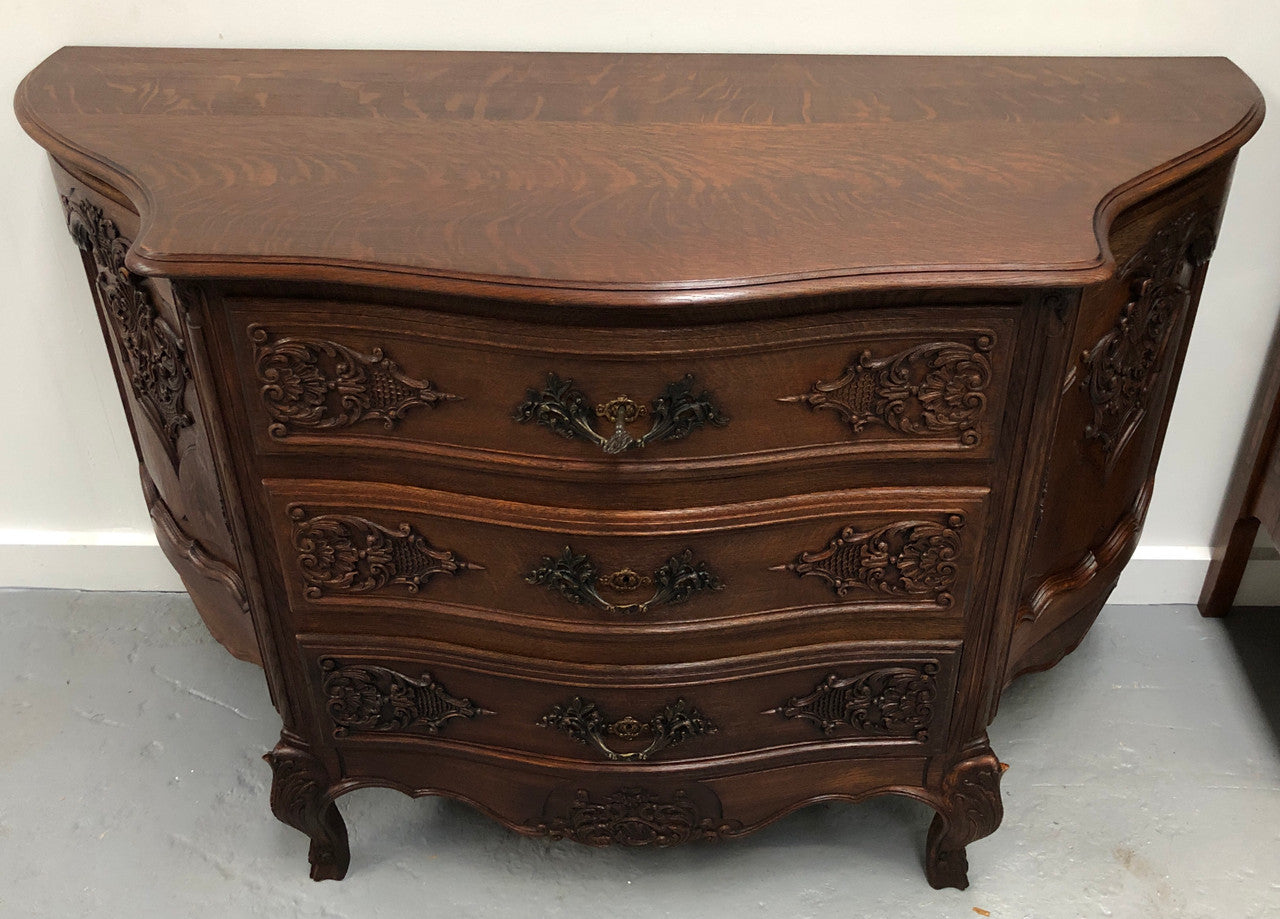 French Louis XV style dark Oak carved, two door and three drawer Commode /side cabinet. Could also be used as a TV cabinet or in the bedroom as storage very versatile. In good original detailed condition.