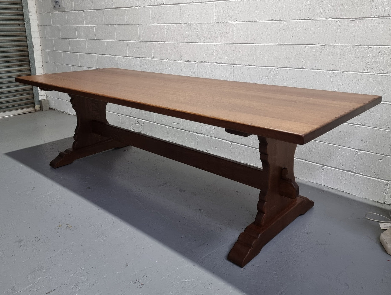 Sensational long French Oak farmhouse table of large proportions on a stretcher base. It has been fully restored with a hard oil water resistant finish. This fabulous table would seat 10 to 12 people.