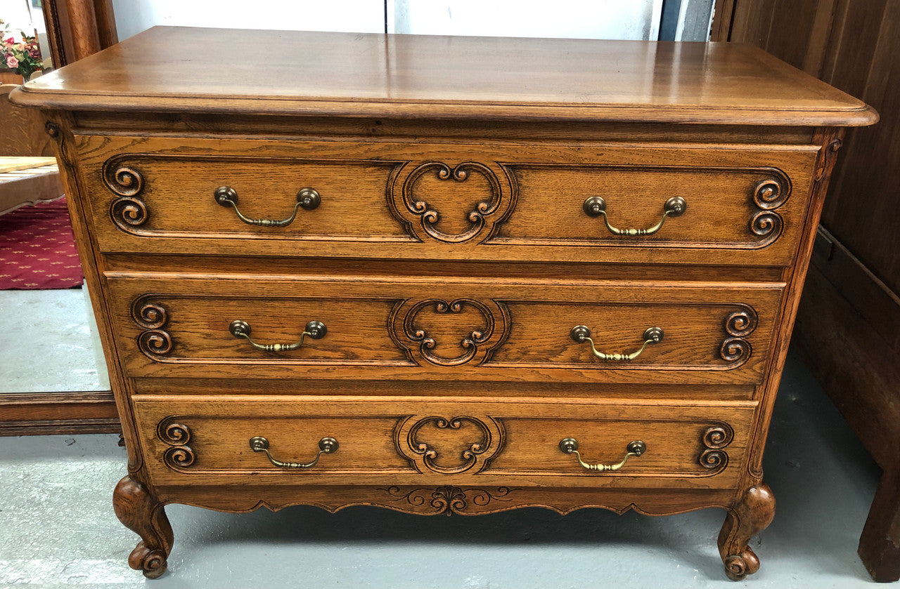 French nicely carved Oak chest of three drawers. In good original detailed condition.