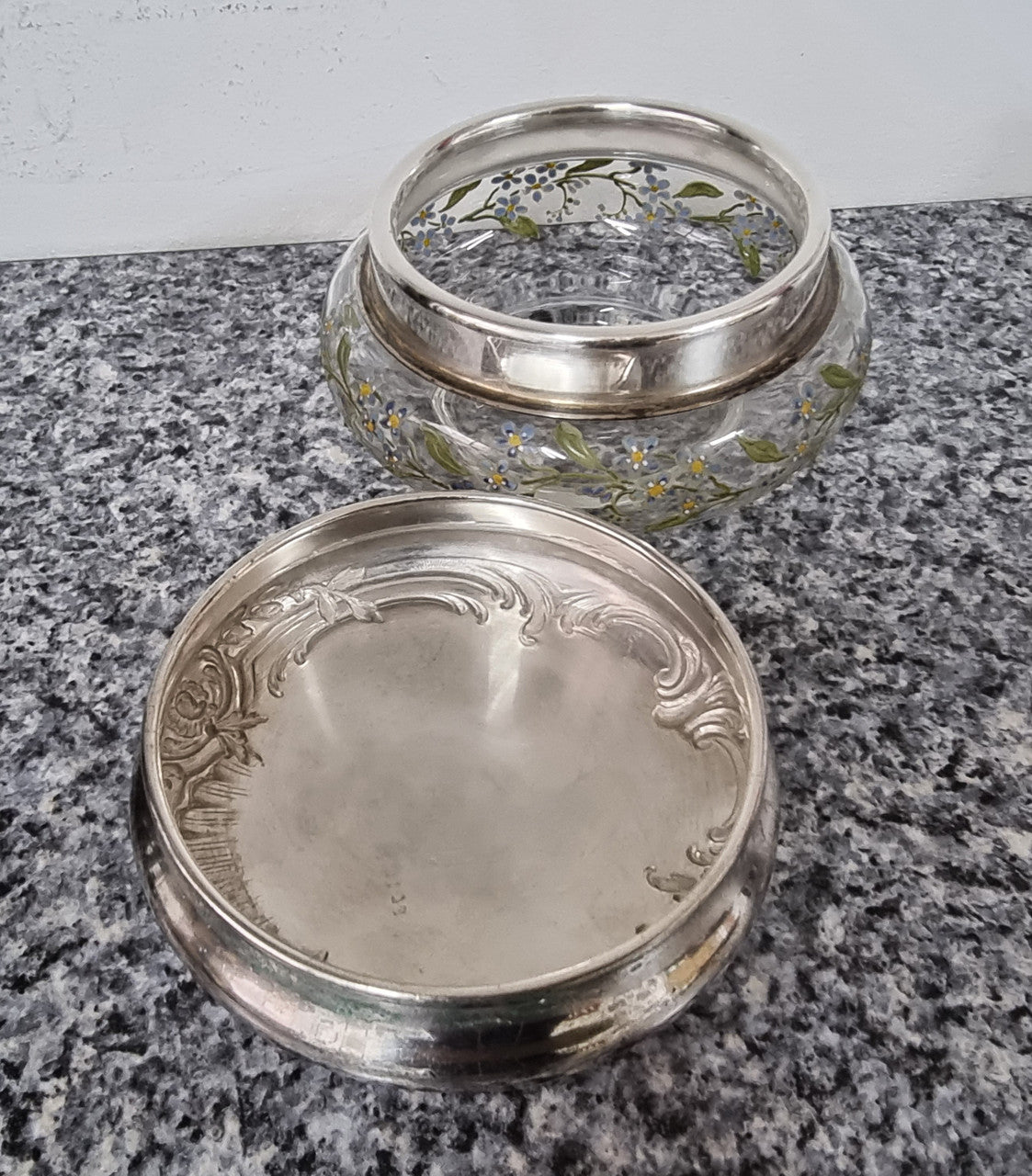Silver lidded dressing table powder/trinket bowl with beautifully hand-painted floral enamel. In good condition please view photos as they help form part of the description.