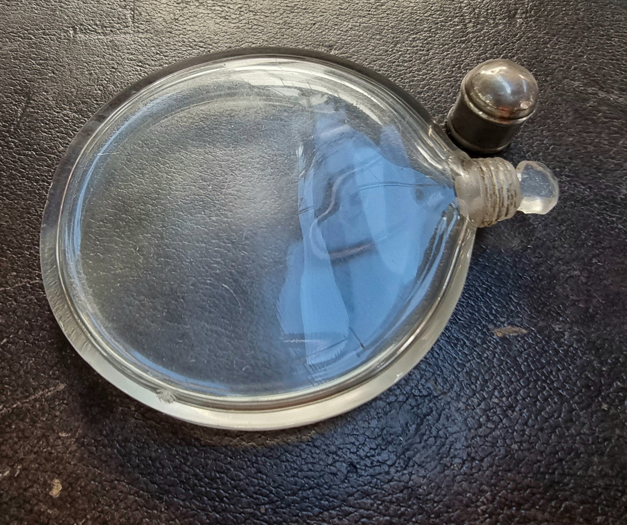 Simple but beautiful Antique silver and cut crystal perfume bottle . It also so has a lovely small internal stopper see photos. It is in good original condition.