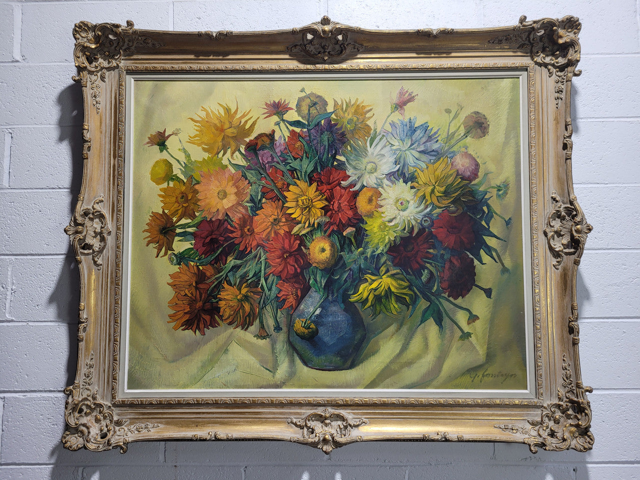 Large vibrant French oil on canvas of flowers and signed “Y.Fonteyn". In an amazing gilt frame and is in good original condition.