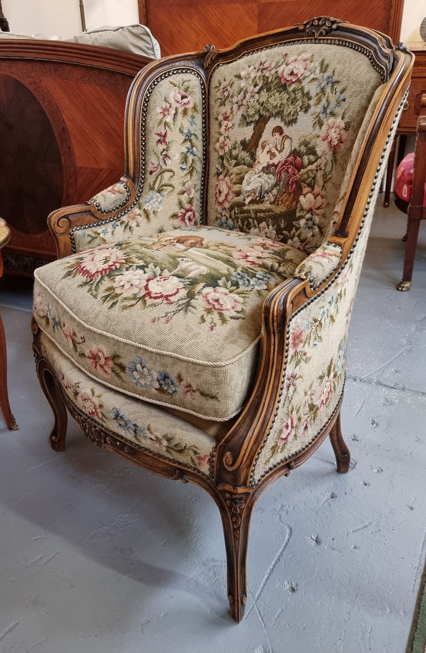 Pair of amazing French Walnut tapestry covered armchairs. The tapestry is in very good condition, please view photos as they form part of the description. Sourced from France and is in good original detailed condition.
