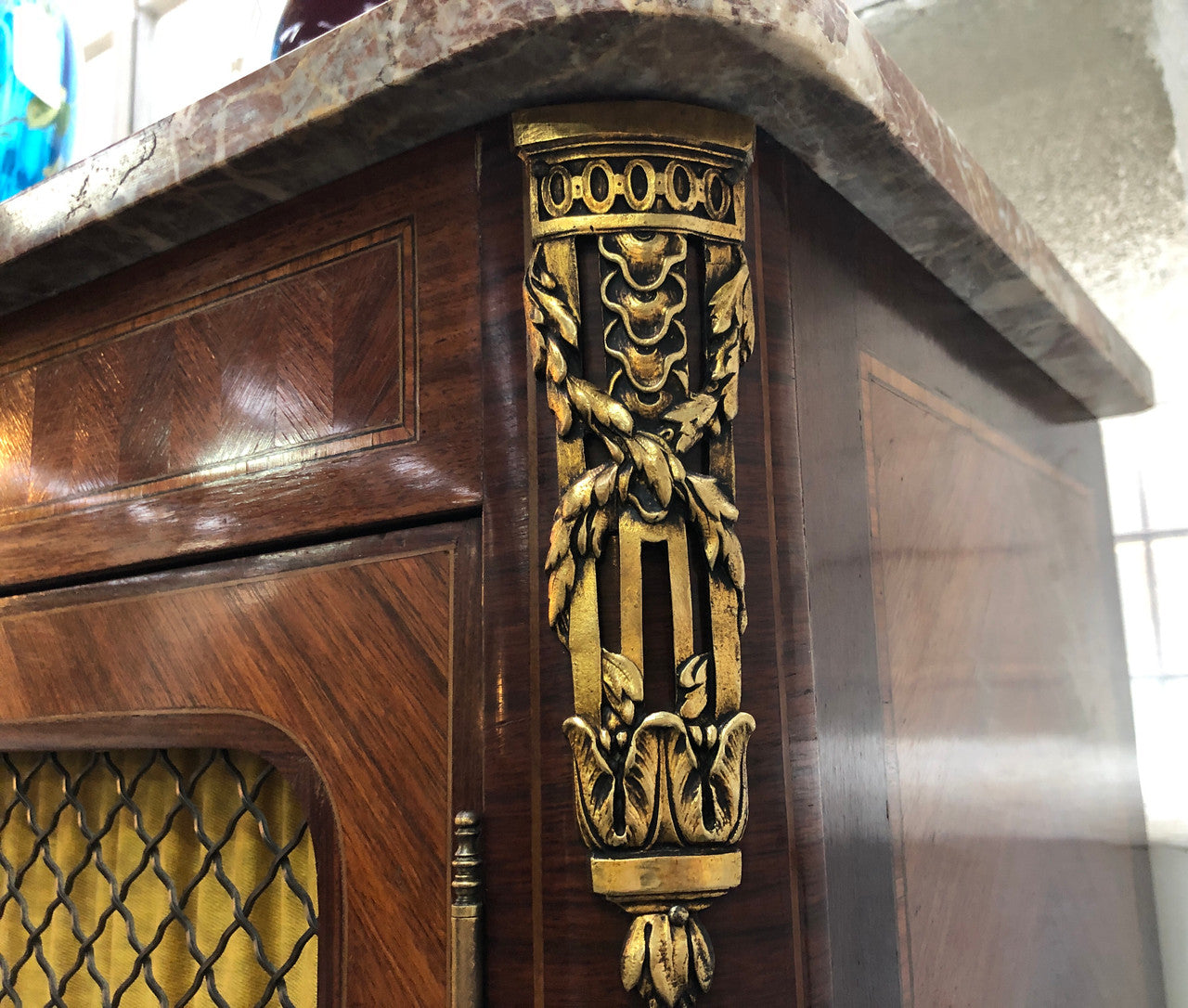 Beautiful 19th Century French Louis XV style Mahogany Blind Bookcase. This piece has lovely inlaid doors and ormolu mounts, marble top and four adjustable shelves. In good original detailed condition.