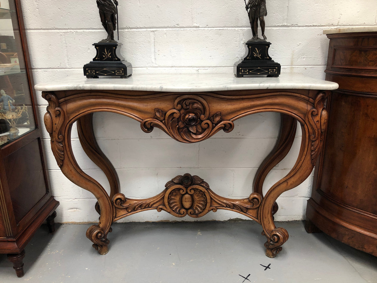 19th Century Louis XV style beautifully carved console table. With detailed ornate carving and a beautiful marble top. In good original detailed condition.