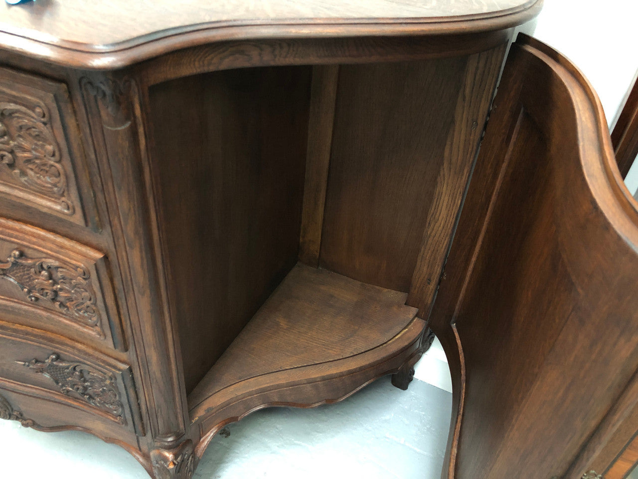 French Louis XV style dark Oak carved, two door and three drawer Commode /side cabinet. Could also be used as a TV cabinet or in the bedroom as storage very versatile. In good original detailed condition.