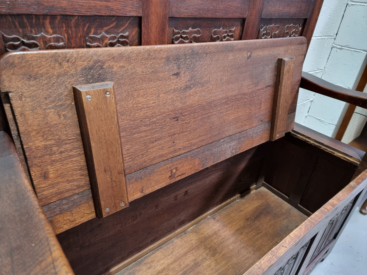 Decorative and nicely carved French Oak 19th Century hall seat with lift up lid for storage. Beautiful details and in good original detailed condition.