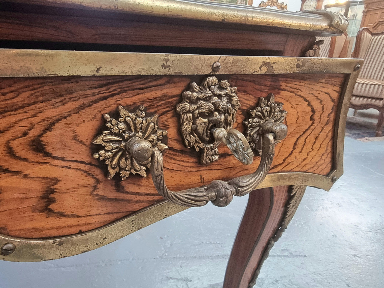 Beautifully fully restored French Antique Rosewood partners desk with beautiful ormolu detail and lovely tooled new leather top. There are three functioning drawers on one side for all your storage needs.