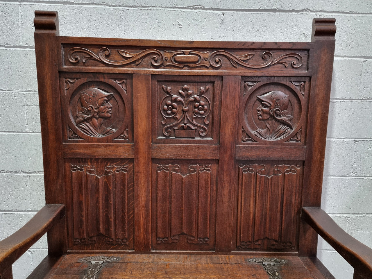 Decorative and nicely carved French Oak 19th Century hall seat with lift up lid for storage. Beautiful details and in good original detailed condition.